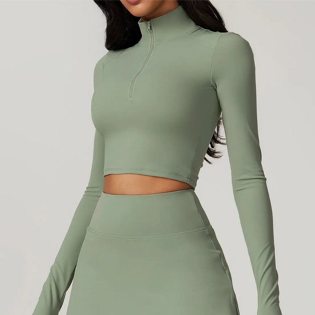 Top demi-zip KIVARA Motion crop – manches longues, seconde peau Kivara Wear